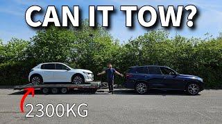 BMW X5 45e plug-in electric hybrid towing test.