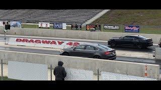 Ford Fusion Sport drag races Camaro SS 2010 BMW M5 and a Mustang GT