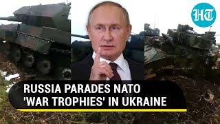 Putin Humiliates NATO Russia Parades Captured German Tanks U.S. Bradleys In Ukraine  Watch