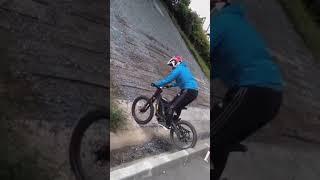 Surron Rider Takes on Impossible Uphill Climb Under Bridge