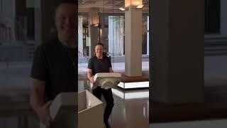 Elon Musk turns up at Twitter HQ carrying a sink