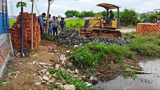 Start a new project Filling Land by Bulldozer Pusing soil water with Truks 5ton