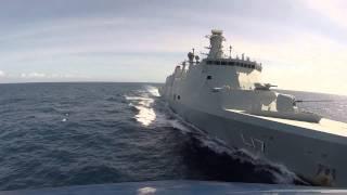 Lynx Helicopter around HDMS Esbern Snare in The Indian Ocean.