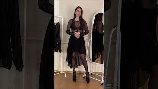 Trying on black transparent blouses