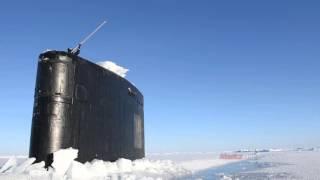 US Navy Submarine USS Hartford breaks through the Arctic Circle ice