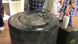 Tibetan Art Center-798 Art ZoneBeijing on 30-APR-17.Water flow from top of stonenot going to floor