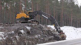Volvo EC300E removing topsoil