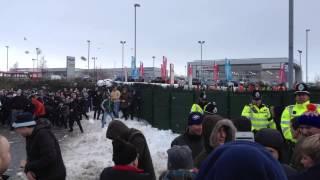 Epic snowball fight between Manchester City fans at Stoke away