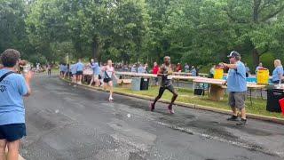 Elite runners from the mens field run at the QC Times Bix 7 turnaround