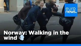 Walkin in the Wind People blown over in streets as Storm Ivar hits Norway  euronews 