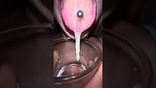 Lila long dirty tongue piercing hocking and spitting loogies showing mouth throat and uvula