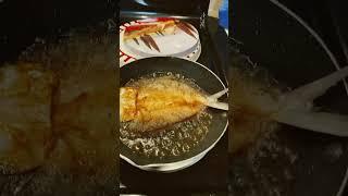 #a  cooking. A milk fish with vegetables 