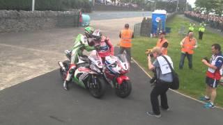 John McGuinness celebrates winning this years Senior TT at record breaking pace