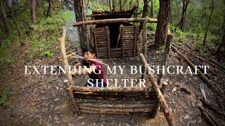 Extending Bushcraft woods shelter.