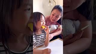 Kid pranks mom with candy whistle ️