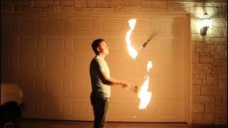 JUGGLING FIRE AT NIGHT