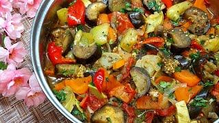 Vegetable stew of zucchini and eggplant. Stewed vegetables in their own juice. Not an ounce of water