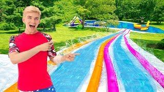 Worlds BIGGEST Inflatable Backyard Slip N Slide Sharer Family Ultimate Surprise Party Reveal