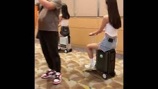 Airwheel SE3S Black Pink Silver rideable smart Mini electric scooter tech luggagesuitcase