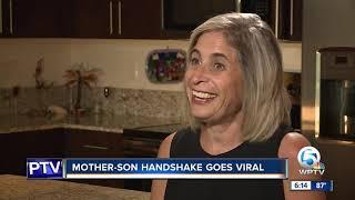 Mother-son handshake goes viral