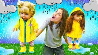 Ayşe Gül ve Ece için yeni yağmurluk takımı alıyor. Baby Born bebek bakma oyunları