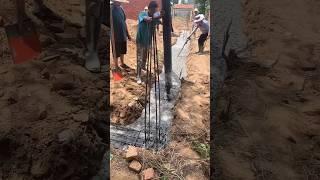 Pouring concrete for rural house foundation