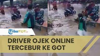 Viral Video Driver Ojek Online Tercebur ke Got saat Banjir Warganet Merasa Kasihan tapi Terhibur