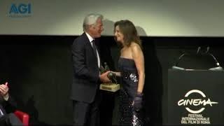 Debra Winger presents Richard Gere with an award at the Rome Film Festival 2011