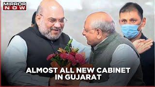 Gujarat BJP leaders in huddle New Cabinet members to take oath