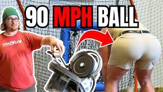 Baseball pitching machine versus mans BUTTOCKS