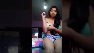 girl removing bra on camera