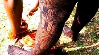 Beautiful African Lady Slaughter Chicken with Pantyhose and Boots