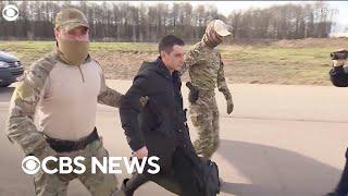 Video shows Trevor Reed at Moscow airport following prisoner swap