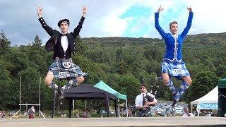 Great Highland Fling performance by competitors at Kenmore Highland Games in Perthshire Scotland