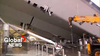 India floods Heavy rains collapse New Delhi airport roof cause traffic chaos