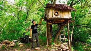 Life in a TREE HOUSE  Sorting out a blockage of logs on the river  Im learning to fly fishing