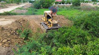 Wow amazing bulldozers use strong power pushing dirt and filling land with dump Trucks