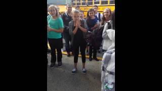 Navy sailor surprising sister at school