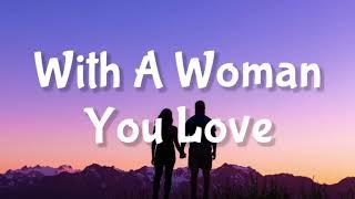 With A Woman You Love - Justin Moore Lyrics 