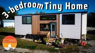 Living her best life in stunning Tiny House with 3 standing bedrooms