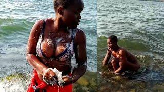 African Village Girls Bathing At The Lake