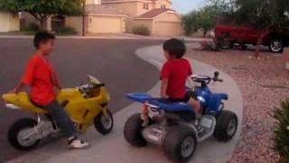 Motorcycle 4 year old on ATV 12 volts versus 7 year old on Motorcycle 36 volts