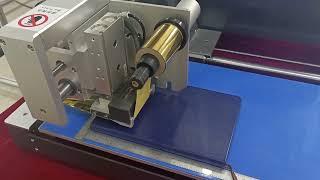 Digital hot foil stamping machine on hard bookcover