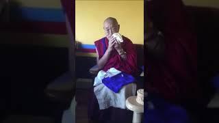 In Memory of His Holiness the 33rd Menri Trizin Lungtok Tenpai Nyima Rinpoche blowing conch shell