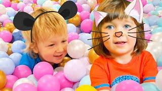 Kids play at the indoor playground Baby girl toy slide & family fun activities for kids.