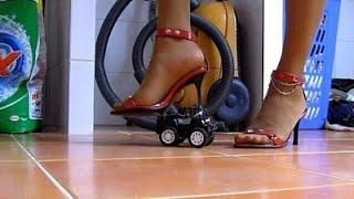 Red High Heel Sandals vs Monster Toy Truck