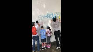 Volunteer family cleaning graffiti Santa Monica Santa Monica 6120