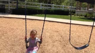 Madison on the big girl swing