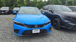 2024 Honda Civic 1.5T Hatchback Sport Touring in Boost Blue Pearl