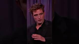 Robert Pattinson in black suit 